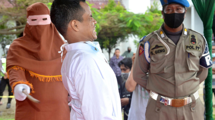 Indonesian Man Collapses During Flogging for Child Rape by Raphael Bichene