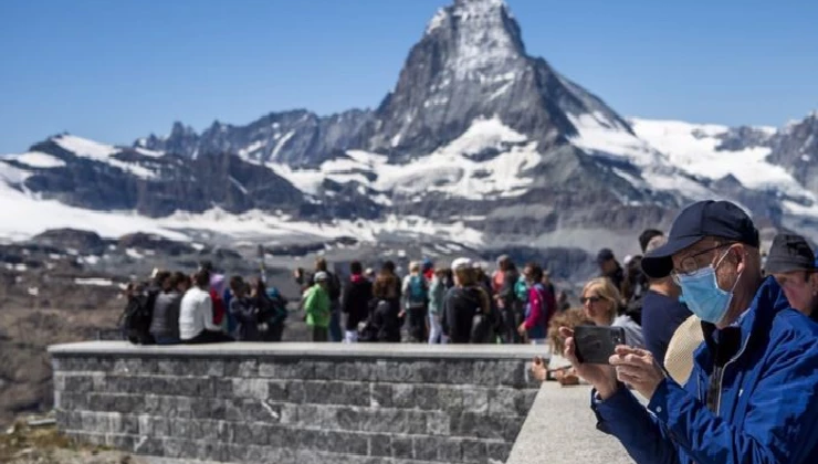 Switzerland Joins List of UK Quarantine Countries by Raphael Bichene