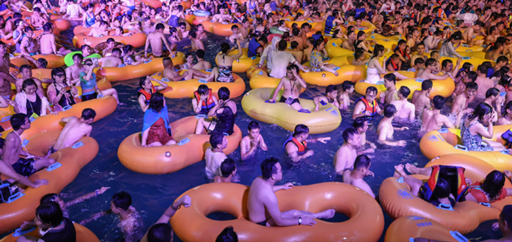 China Defends Wuhan Pool Party After Global Outrage by Francisca Ogar