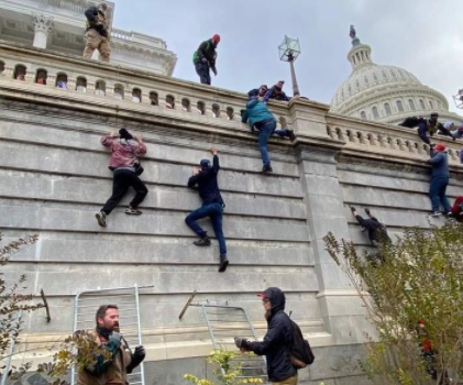 Mob Breach US Capitol in Pro-Trump Protests by Raphael Bichene