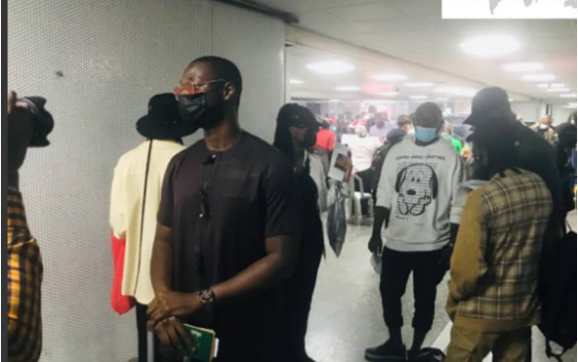 Omah Lay Arrives MMIA Lagos by Raphael Bichene