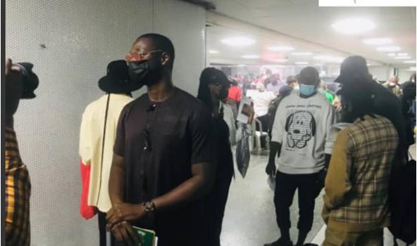 Omah Lay Arrives MMIA Lagos by Raphael Bichene